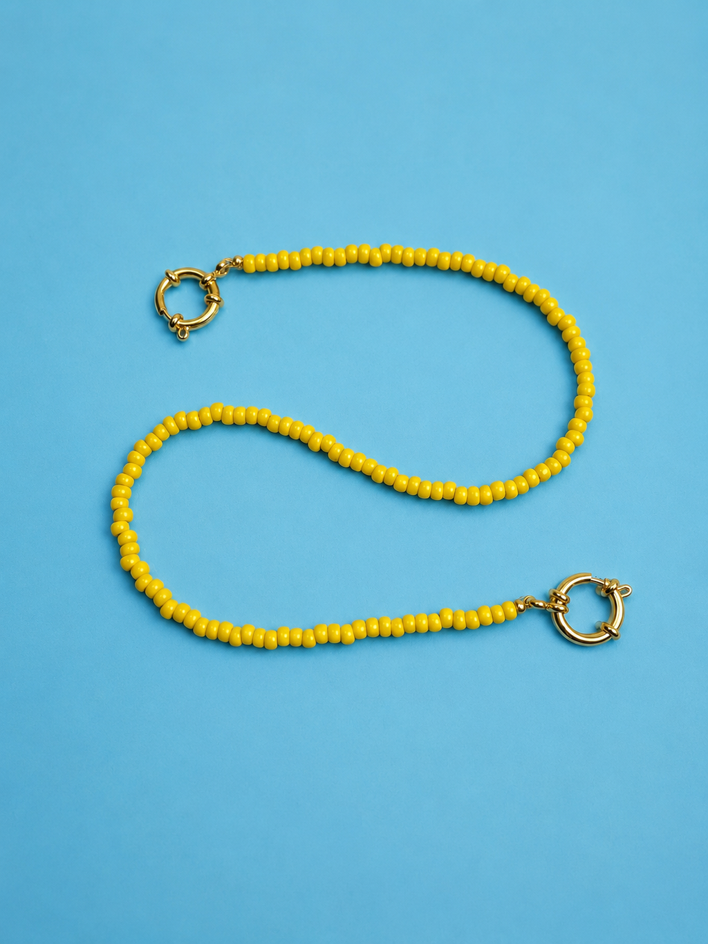 Dopamine: minimalist yellow beaded bag charm