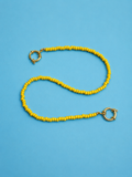 Dopamine: minimalist yellow beaded bag charm