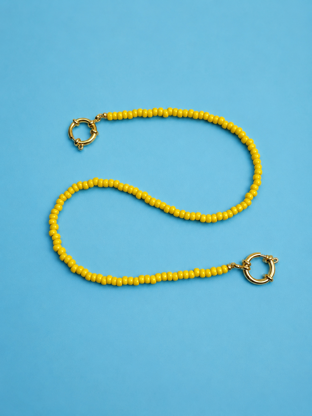 Dopamine: minimalist yellow beaded bag charm
