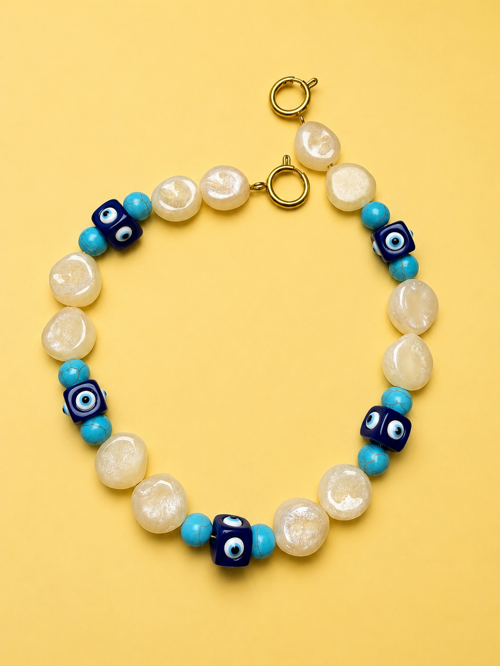 Mati: blue evil eye & cream resin bead bag charm